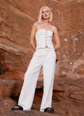 Womens Midnight City Suit Pants in the colour Pebble in front of a light grey background